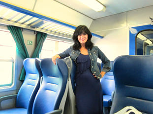 My wife in the train from Domodossola to Milan
